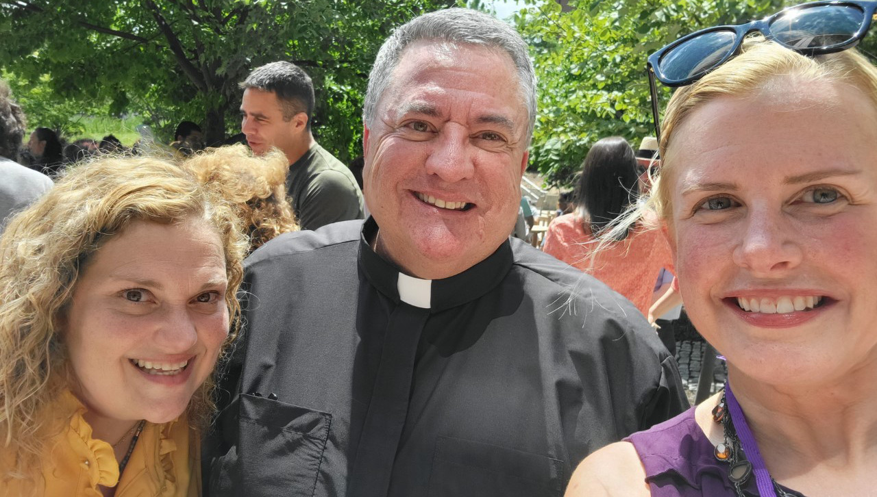 Rev. Joseph Marina, S.J., University of Scranton president with new University Editor Kristie Ceruti and Web Content Strategist Kristin Durkin