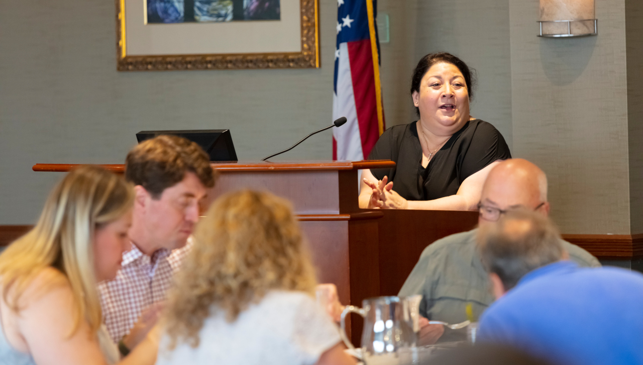 Teresa A. Grettano, Ph.D. associate professor at University of Scranton addresses the audience at Spirituality Luncheon