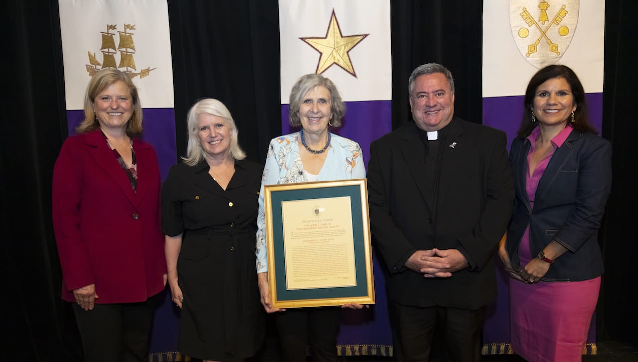 Margarete L. Zalon, Ph.D., professor of nursing at The University of Scranton, received the John L. Earl III Award for 2022. From left are: Victoria Castellanos, Ph.D., dean of the University’s Panuska College of Professional Studies; Jacqueline Earl Hurst daughter of the late John Earl; Dr. Zalon,John L. Earl III Award recipient; Rev. Joseph Marina, S.J., president; and Michelle Maldonado, Ph.D., interim provost and senior vice president for academic affairs.