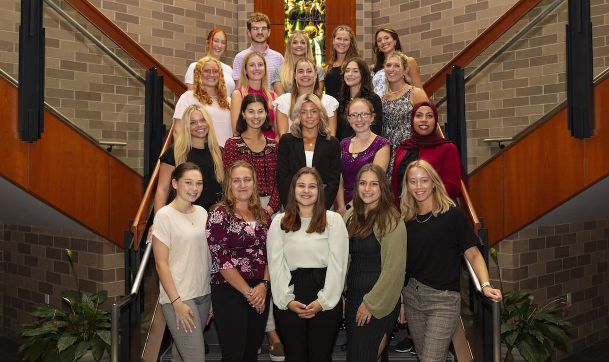Twenty University of Scranton education majors who are serving as student teachers during the fall semester at ten local schools