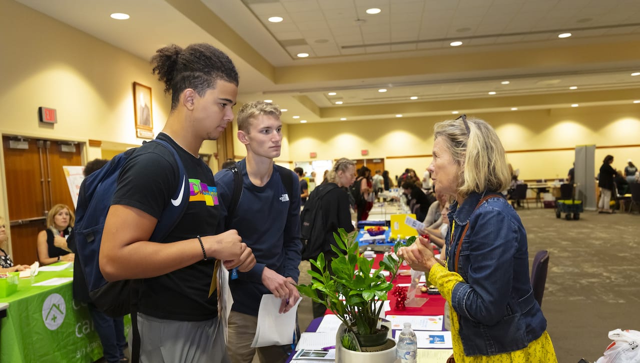 University of Scranton students wishing to serve the community learned about volunteer opportunities at more than 50 area nonprofit organizations at the University’s annual Volunteer Fair. From left: University students Mason DiCesare, a first-year biology major on the premed track from Feasterville-Trevose, and Jordan Wagner, a first-year biology major on the premed track from Falls, meet with Donna Doherty of Traditional Home Health Care in Dunmore. 