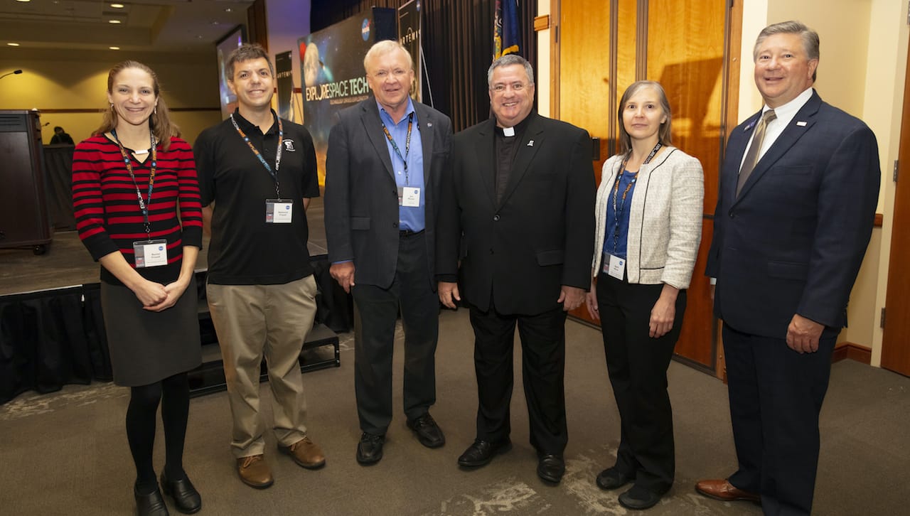 Representatives from NASA hosted events over a two-day period at The University of Scranton in September. Events included a panel discussion about career paths at NASA for local high school and University students, as well as the NASA Northeast Pennsylvania Industry Day for local business owners and manufacturers to learn about ways companies and individuals can support Artemis and future space missions. From left: Rachel Frissell, faculty specialist, physics and engineering, The University of Scranton; Nathaniel Frissell, Ph.D., assistant professor of physics and engineering, The University of Scranton; James L. Reuter, associate administrator for the Space Technology Mission Directorate, NASA; Rev. Joseph Marinia, S.J., president of The University of Scranton; April Niver, Ph.D., economic development director for U.S. Rep. Matt Cartwright Office; and Jeffrey Box, president and CEO NEPA Alliance.