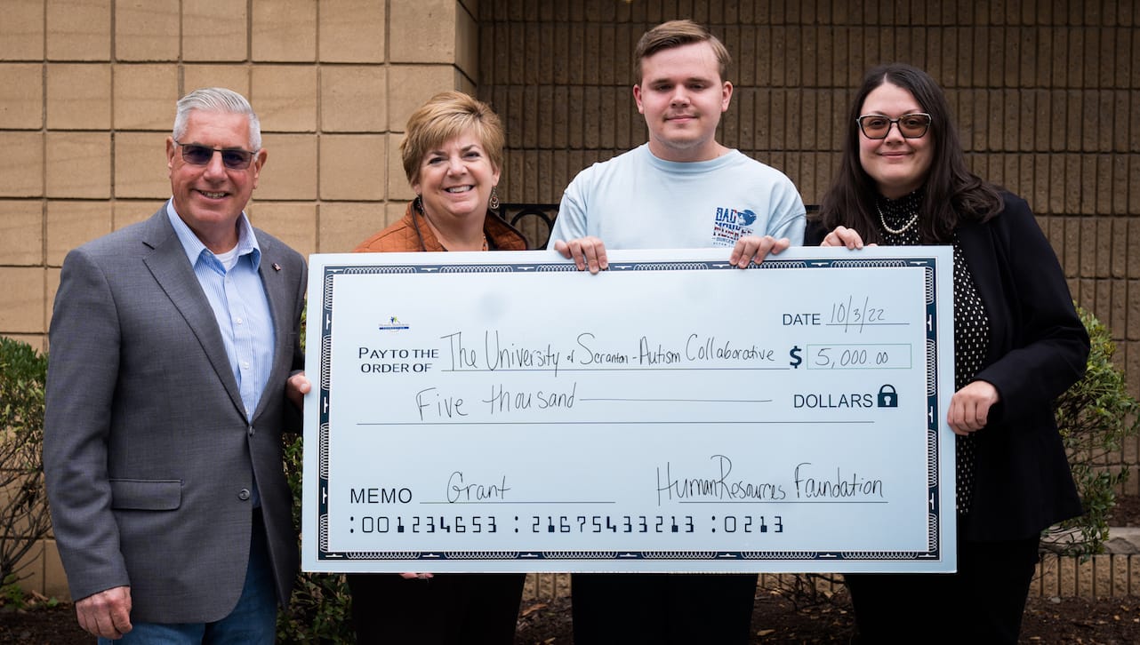 The Human Resources Foundation awarded a $5,000 grant to The University of Scranton’s Autism Collaborative Center of Excellence to support advocacy and socialization programming for students with disabilities. From left: Daniel J. Card, executive director; Human Resources Foundation, Honesdale; Rose Termini, Center of Teaching and Learning Excellence disability student support specialist, The University of Scranton; University student Jacob Charles, Scranton; and Erin Dunleavy, Ph.D., The University of Scranton Autism Collaborative Center of Excellence project manager.