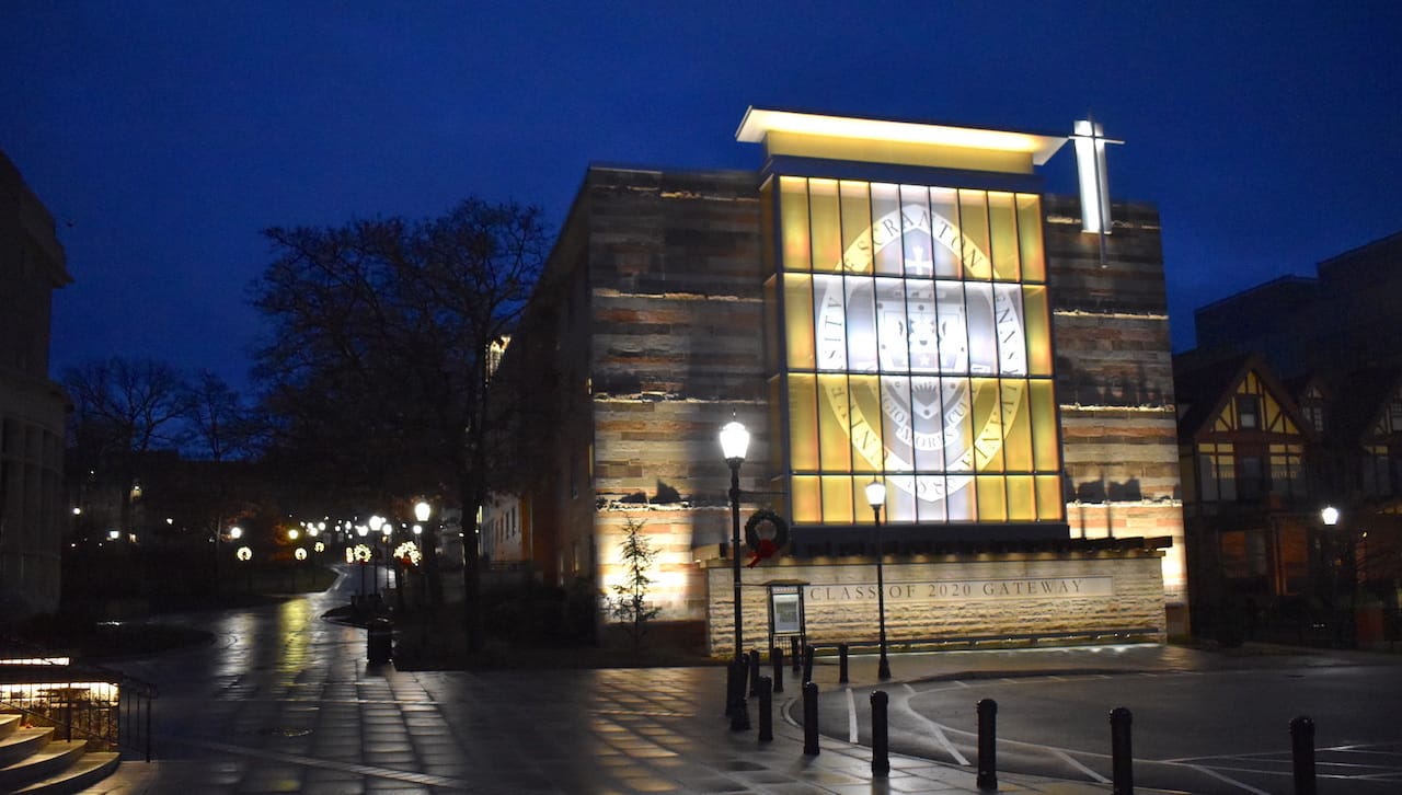 The University of Scranton will light its four-story, Class of 2020 Gateway sign with a white cross and gold background in memory of Pope Emeritus Benedict XVI on Jan. 3, 4 and 5. 