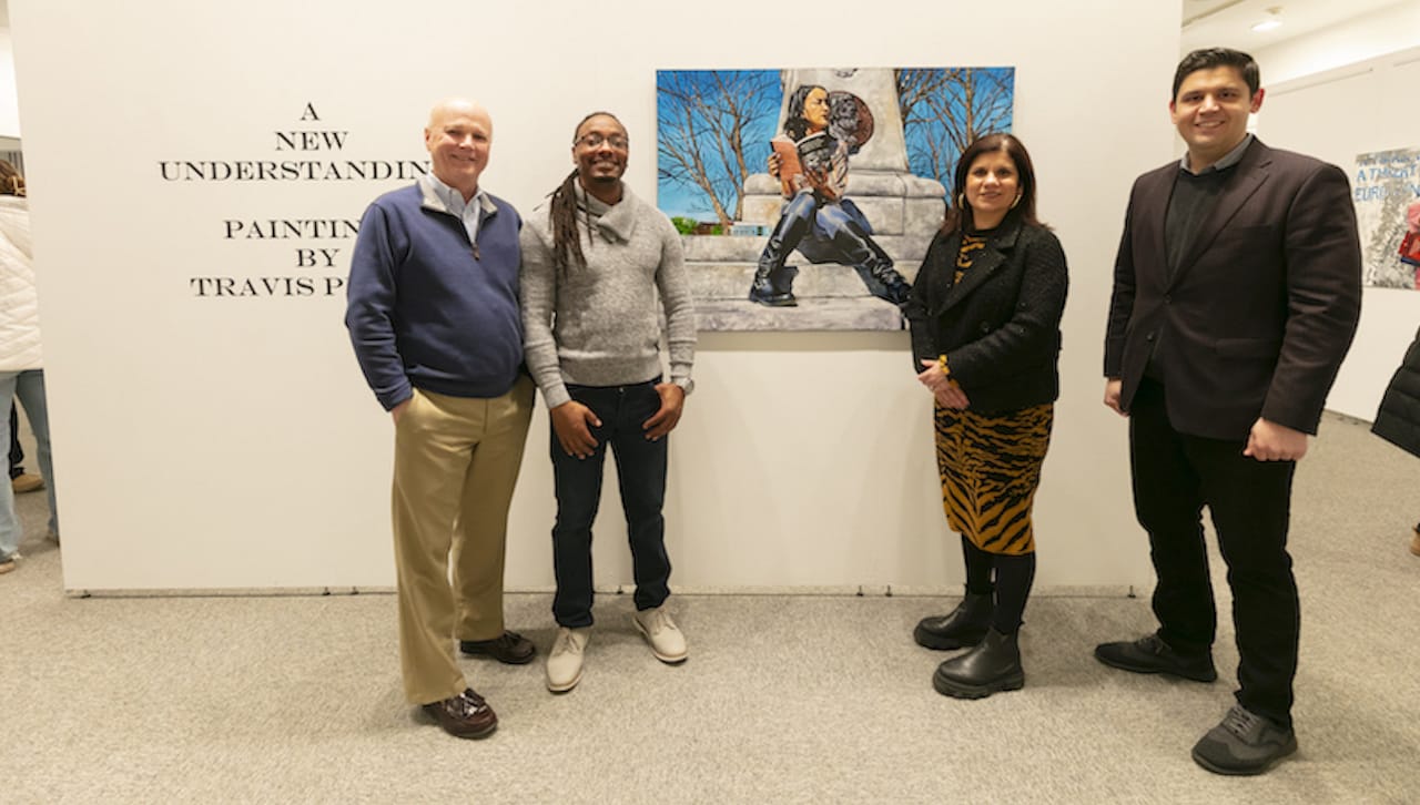 At the opening reception for “A New Understanding: Paintings by Travis Prince” are, from left: Mark Higgins, Ph.D., dean of the Kania School of Management at The University of Scranton; Travis Prince, exhibiting artist; Michelle Maldonado, Ph.D., interim provost and senior vice president for academic affairs at Scranton; and George Aulisio, dean of the Weinberg Memorial Library at Scranton.