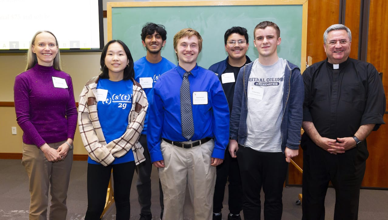 Five area high school students were the finalists in The University of Scranton’s 2023 Math Integration Bee held on campus in April. From left are: Stacey Muir, Ph.D., professor of mathematics at The University of Scranton; and finalists Angela Zeng, Abington Heights High School; Sai Ghatti, Abington Heights High School; Noah Beckish, North Pocono High School; Daniel Martinez, Pocono Mountain West High School; and Andrew Sutton, Central Columbia High School, who won the contest; and Rev. Joseph Marina, S.J., president of The University of Scranton.