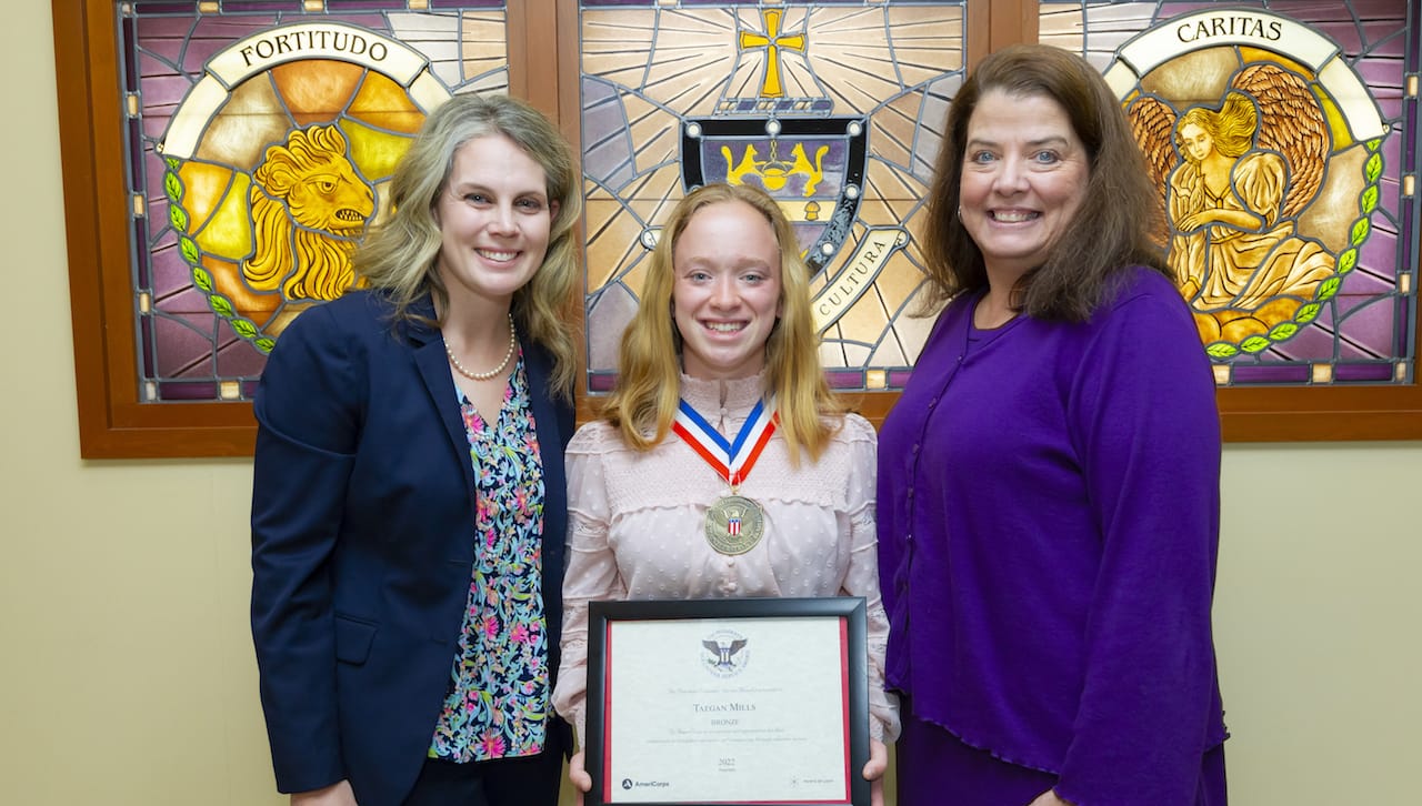 University of Scranton sophomore and ROTC cadet Taegan Mills, Montrose, received the President’s Volunteer Service Award Bronze Medal in recognition of her volunteer service. From left are Lauren Rivera, J.D., M.Ed., vice president for student life; President’s Volunteer Service Award medalist Taegan Mills; and Barbara King, coordinator for student life.