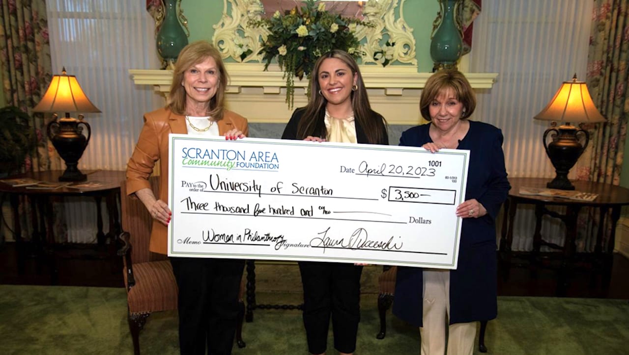 The Women in Philanthropy initiative of the Scranton Area Community Foundation awarded a $3,500 grant to The University of Scranton during the Women in Philanthropy Quarterly Meeting and Reception held at the Century Club of Scranton this spring. From left: Patty Thomas, Women in Philanthropy supporter; Avianna Carilli, coordinator of domestic and international service programs at The University of Scranton; and Donna Barbetti, Women in Philanthropy supporter and board governor at the Scranton Area Community Foundation.