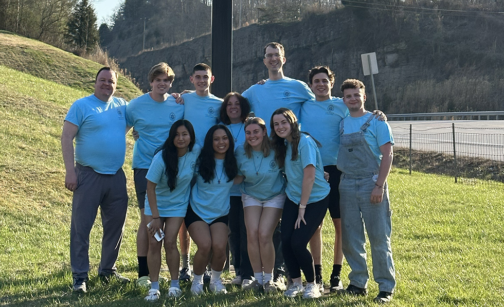 Isabelle Wohlleber '24, dedicated her efforts earlier this month when Scranton students and chaperones, assisted with home repair in eastern Kentucky. Shown, first row, from left, are Sarika Mongar, Isabelle Jalandoni, Isabelle Wohlleber and Meghan Martin. Second row, from left: Dr. Sean Brennan, chaperone, Stephen Butler, Andrew Gordos, Andrea Malia, chaperone, Eric Panicco, chaperone, Sam Peters and Jack Burke. This spring break outreach to the Christian Appalachian Project Workfest was one of several organized by the University's Center for Service and Social Justice. 