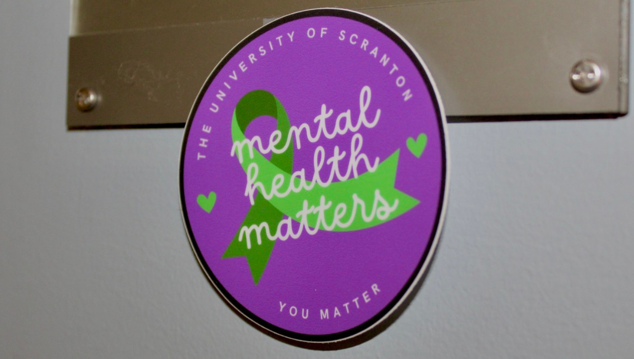 Students are encouraged to look for this sticker to identify folks on campus willing to provide support for mental health and wellness.  