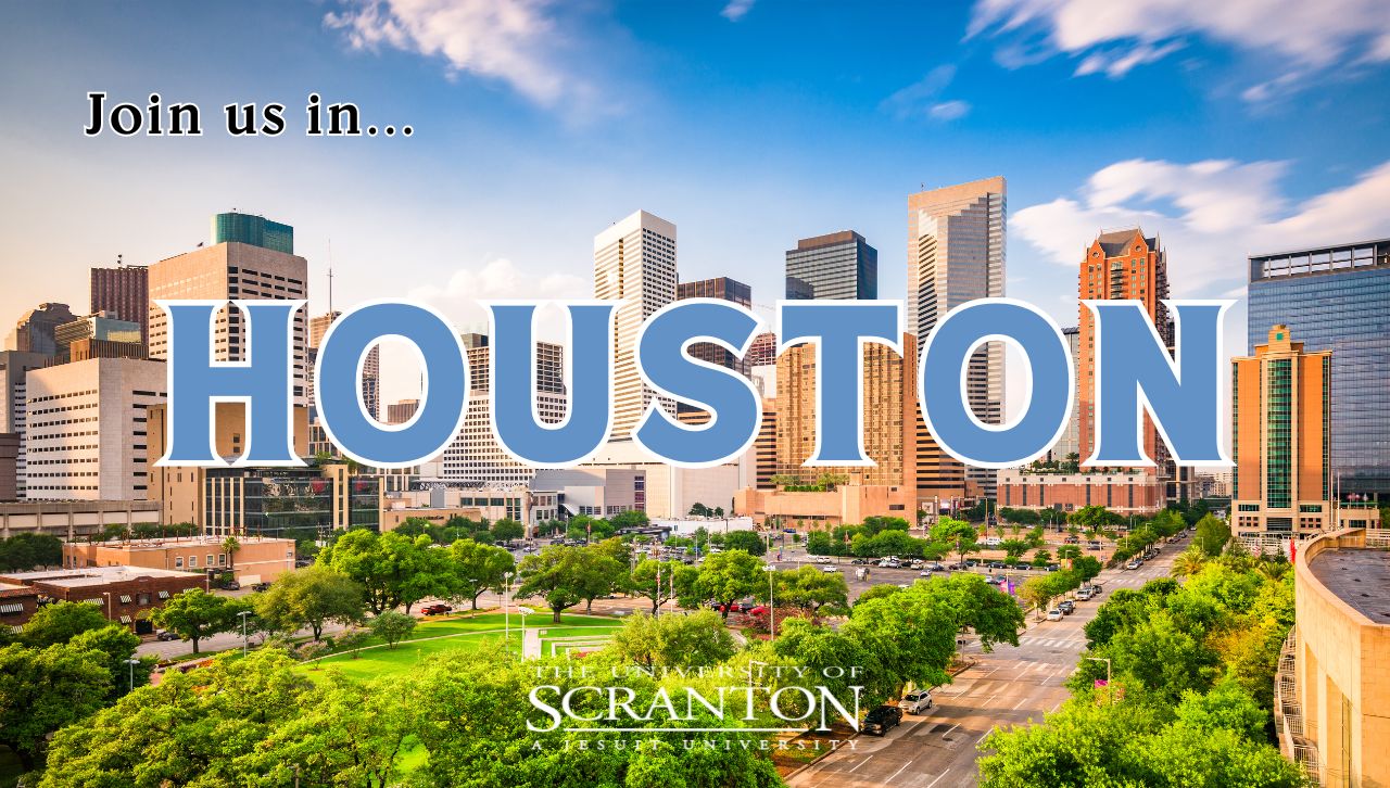 A banner advertising an alumni gathering in Houston April 13, 2024.