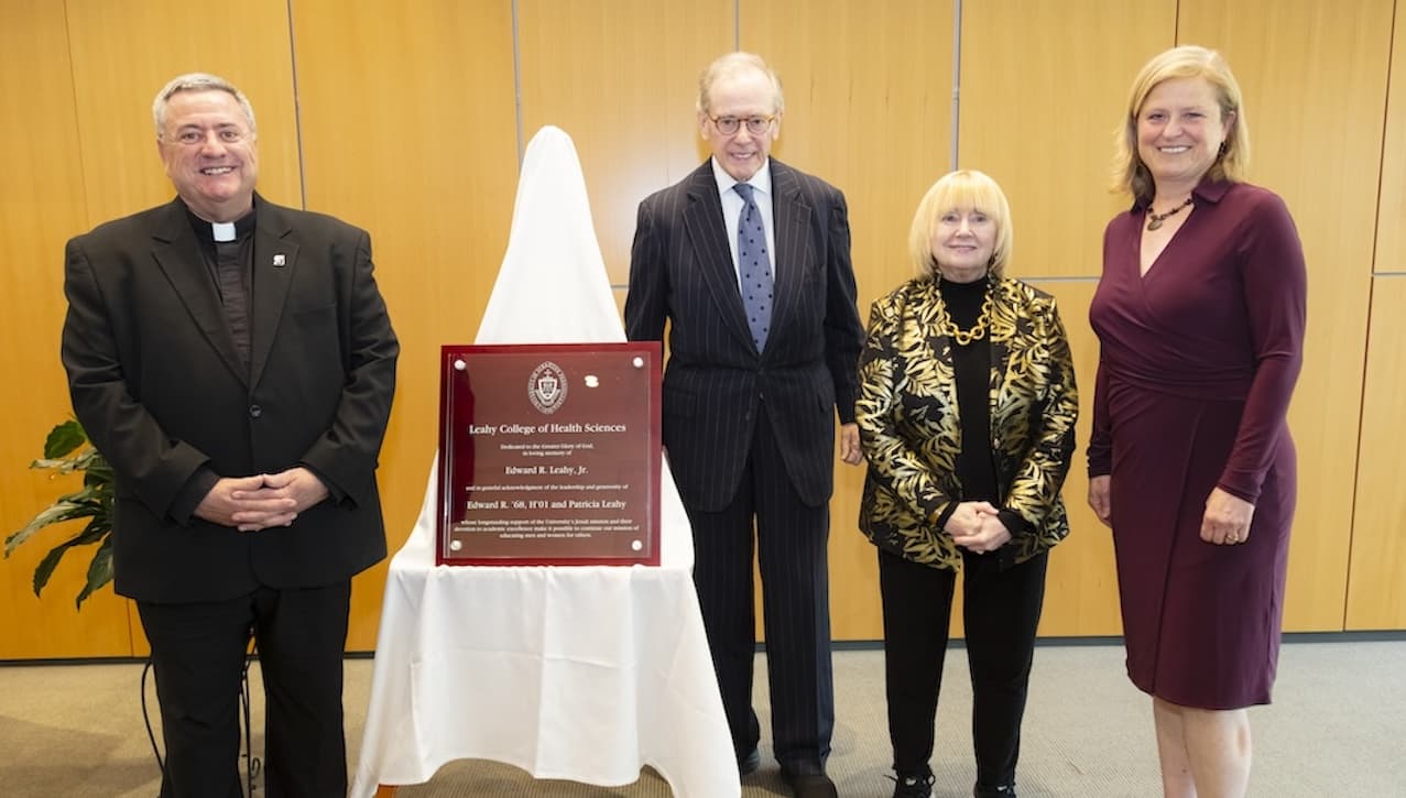 The University of Scranton celebrated the naming of the “Rev. J.A. Panuska, S.J., Commons” and the “Rev. J. A. Panuska, S.J., Faculty/Student Research Program,” in honor of its longest-serving President; and the renaming of the Panuska College of Professional Studies the “Leahy College of Health Sciences,” in honor of long-time University benefactors Edward ’68, H’01 and Patricia Leahy, and their son, Edward, Jr. At the celebration ceremony are, from left, Rev. Joseph Marina, S.J., president of the University, Patricia and Edward Leahy, and Victoria Castellanos, Ph.D., dean of the Leahy College of Health Sciences.