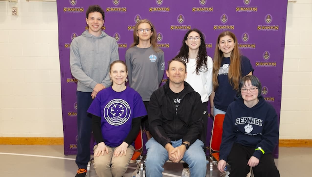 Berwick High School team three placed first in the team competition at The University of Scranton’s annual Hayes Family Science Competition for High School Physics and Engineering Students. Seated from left: Rachel Frissell, faculty specialist for the University’s Physics and Engineering Department, team coach Matthew Shrader and student Emma Czychowski. Standing from left, are students: Chris Bowman, Nate Hook, Skye Terrones ad Makayla Brown. 