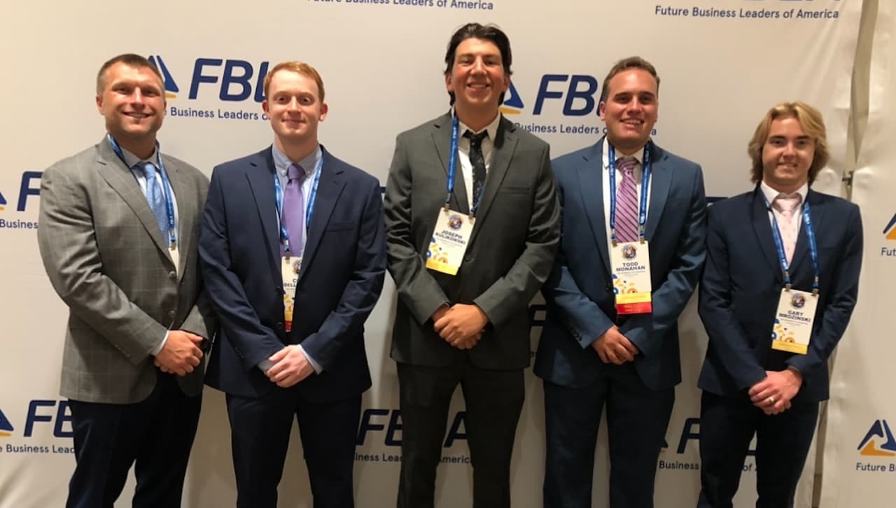 Four University of Scranton students placed in the top ten in competitions at the 2024 Future Business Leaders of America (FBLA) National Leadership Conference, which took place in June in Orlando, Florida. From left, David Mahalak, D. Eng., a faculty specialist in the Operations and Analytics Department and club moderator, Chaz Dellacorte, Joseph Kulikowski, Todd Monahan and Gary Mrozinski.