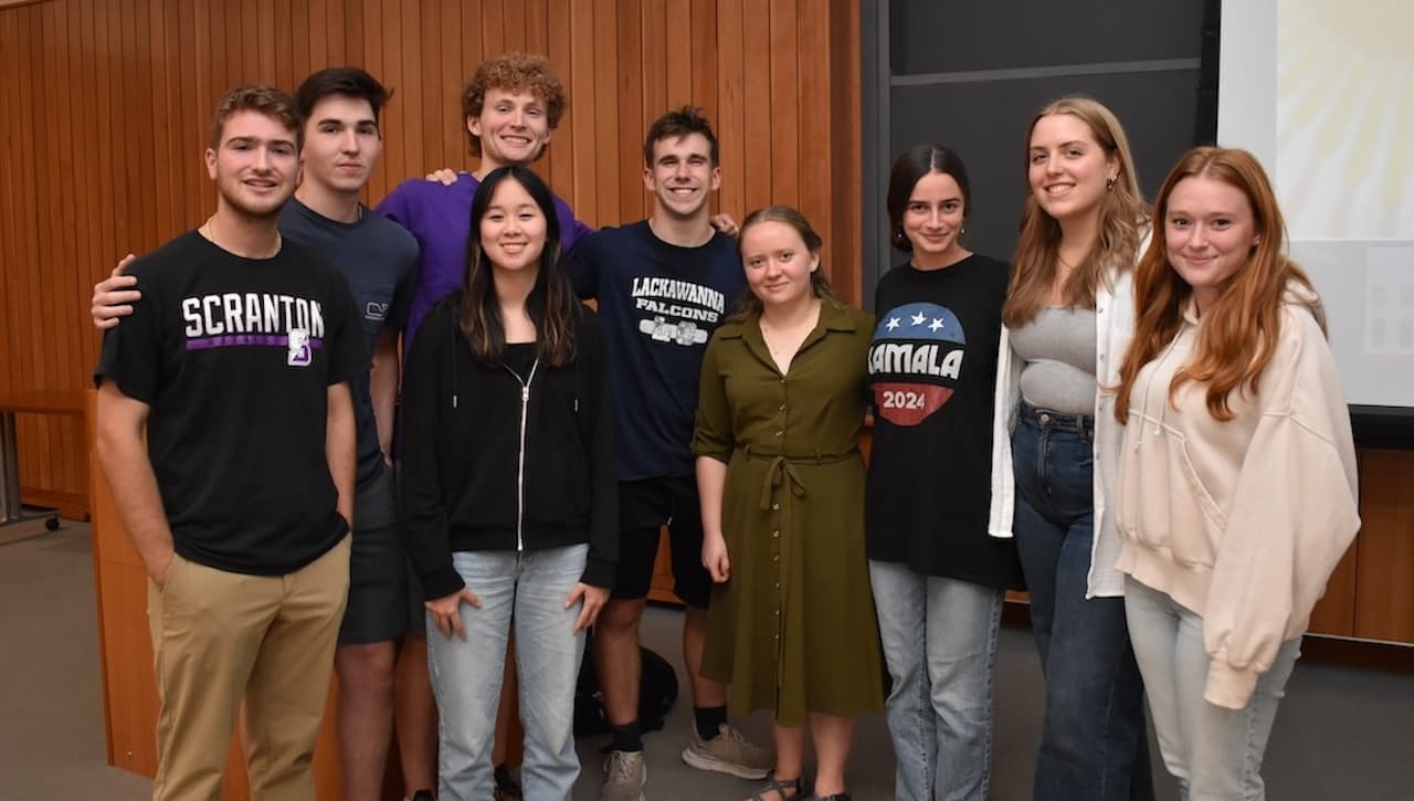 Congeniality Wins at University Presidential Debate Watch image