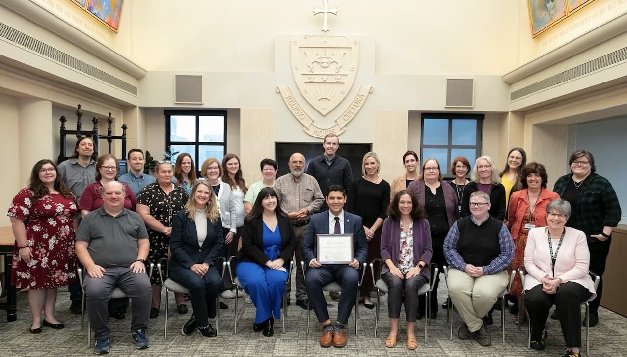 The Pennsylvania Library Association presented The University of Scranton’s Weinberg Memorial Library with the 2024 Library of the Year Award. Seated from left are Weinberg Memorial Library staff and faculty members: Kevin Kocur, Rose Merritt, Sheli Pratt-McHugh, George Aulisio, Ph.D., Donna Witek, Kate Cummings and Jean Lenville. Standing: Melisa Gallo, Eric Pencek, Margaretta Gilhooley, David Hunisch, Mary Kovalcin, Rebecca Dzikowski, Sharon Finnerty, Tiffany Ash, Mary Fran Galat, Michael Knies, Ian O’Hara, Kym Fetsko, Colleen Farry, Marleen Cloutier, Bridget Conlogue, Jennifer Galas, Sylvia Orner, Mary Beth Roche and Sam Davis.