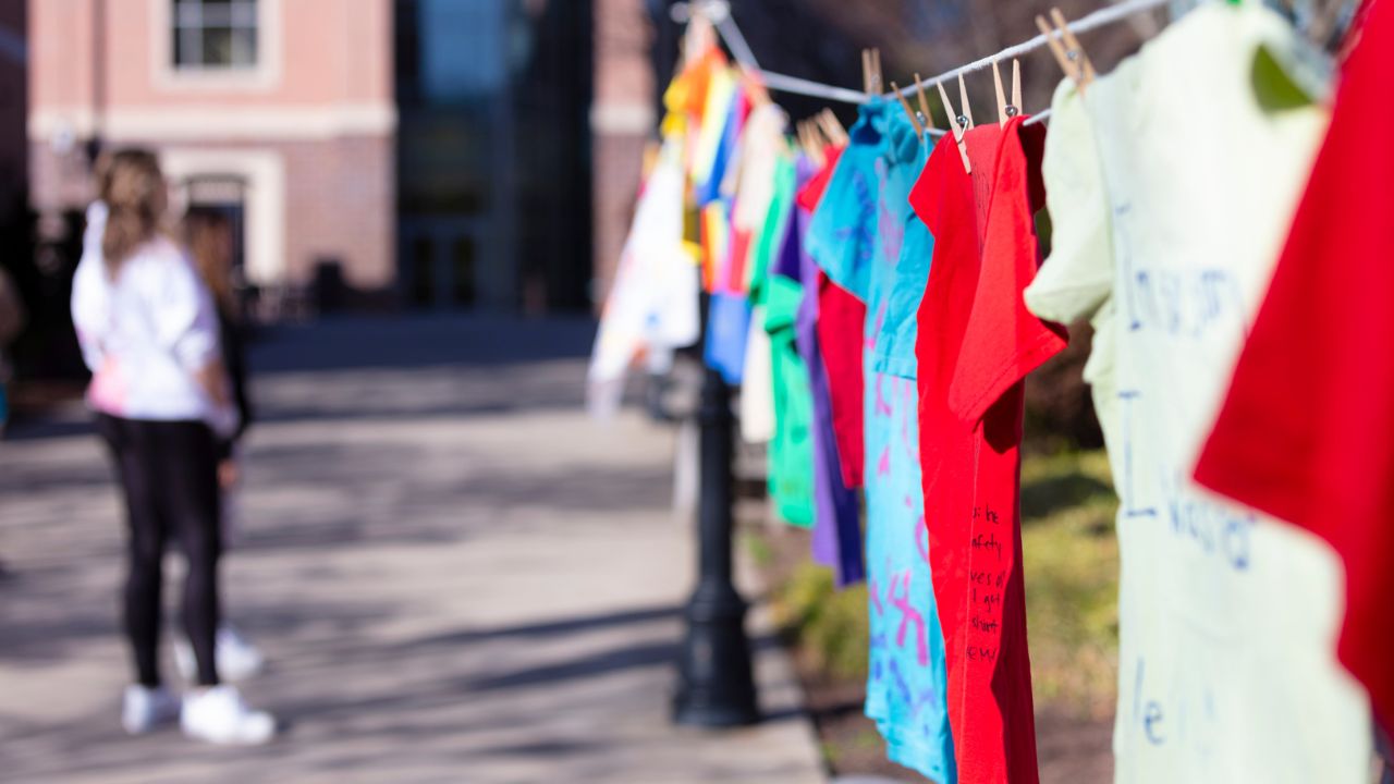 multicolor t-shirts on clothesline to raise awareness