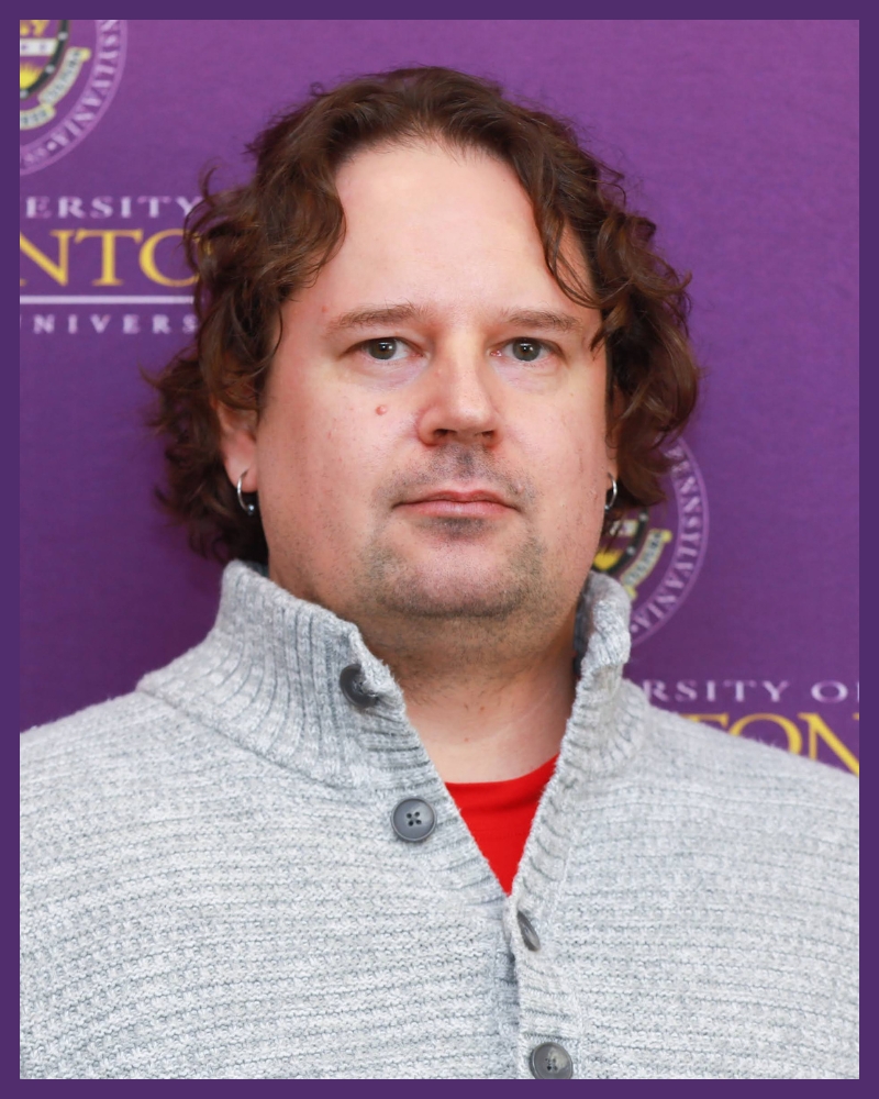 a portrait of an individual with curly hair