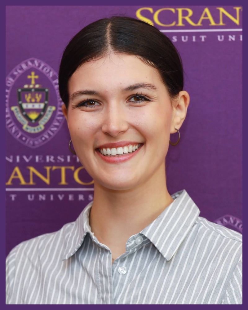 a portrait of an individual wearing a collared shirt