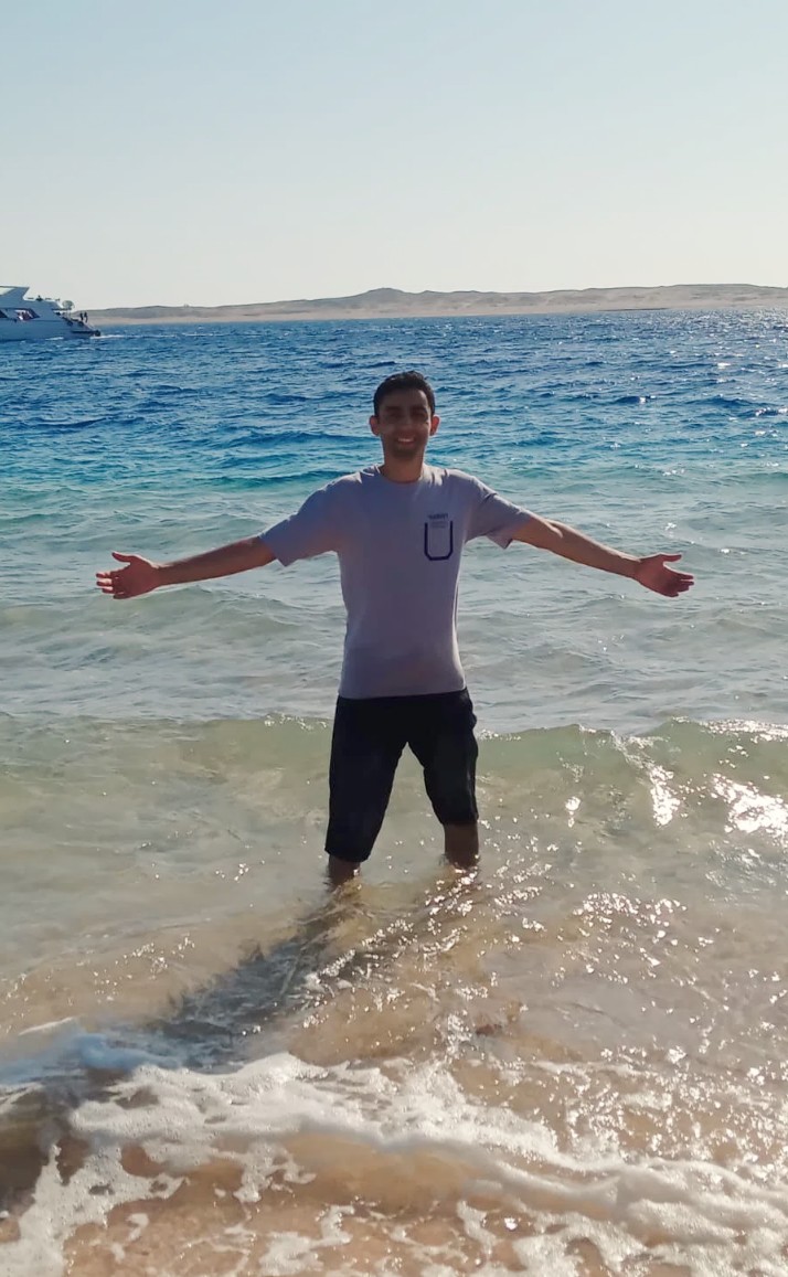 young male in ocean water