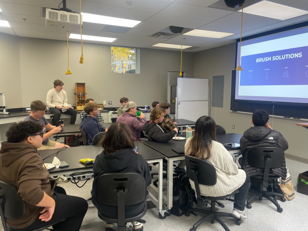 Students collaborate during the latest American Society of Mechanical Engineers (ASME) meeting, where members work together within The University of Scranton's growing mechanical engineering community.