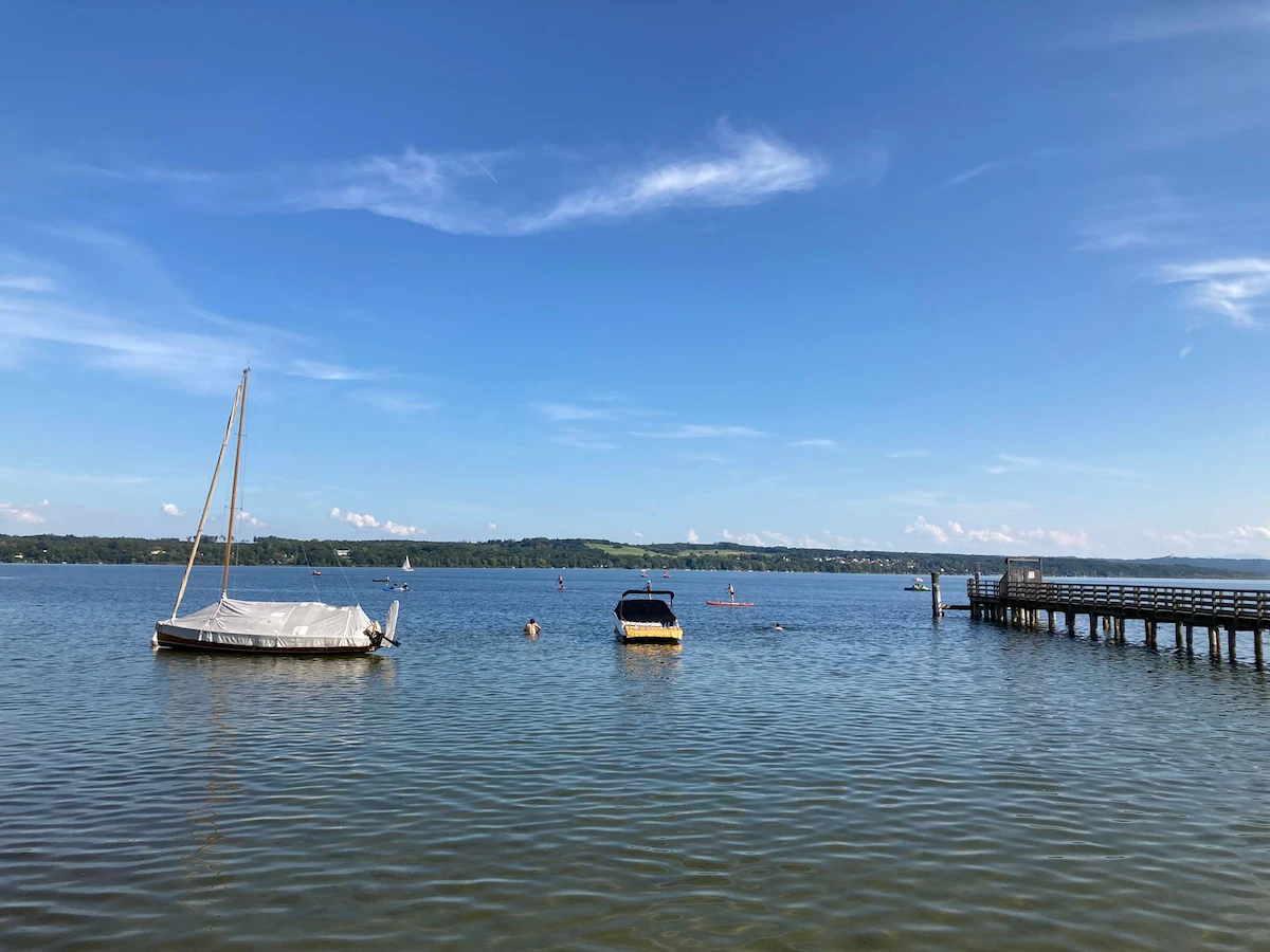 calm waterway with small boats