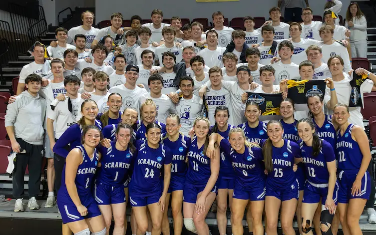 Large group of University of Scranton athletes and students posing together.