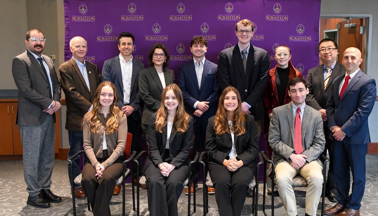 pictured are Six members of The University of Scranton’s class of 2026 graduated from the Jesuit school’s Frank P. Corcione Business Honors Program with faculty advisors.