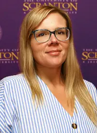 A headshot of an individual.
