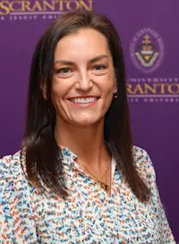A headshot of an individual.