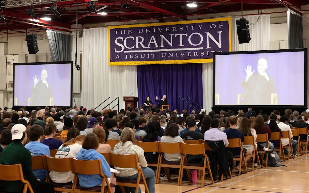A gallery of images from the 2026 Ignatian Values in Action Lecture at the Byron Recreation Complex.
