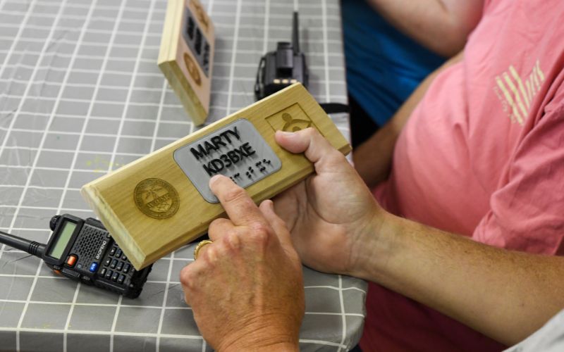 A gallery of images showing volunteers and Lackawanna Blind Association clients working together and celebrating their accomplishments.